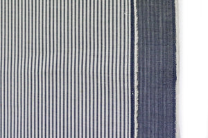 REVERSIBLE CHAMBRAY BLUE GREY WITH SUBTLE HICKORY STRIPES.